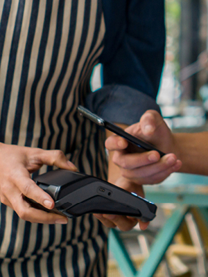 someone paying with their phone