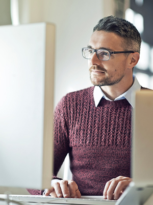 man working on a computer