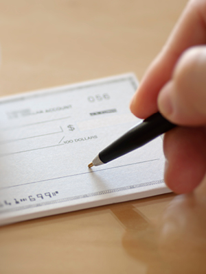 someone writing a check