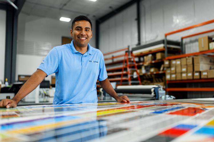 man working on something in a warehouse
