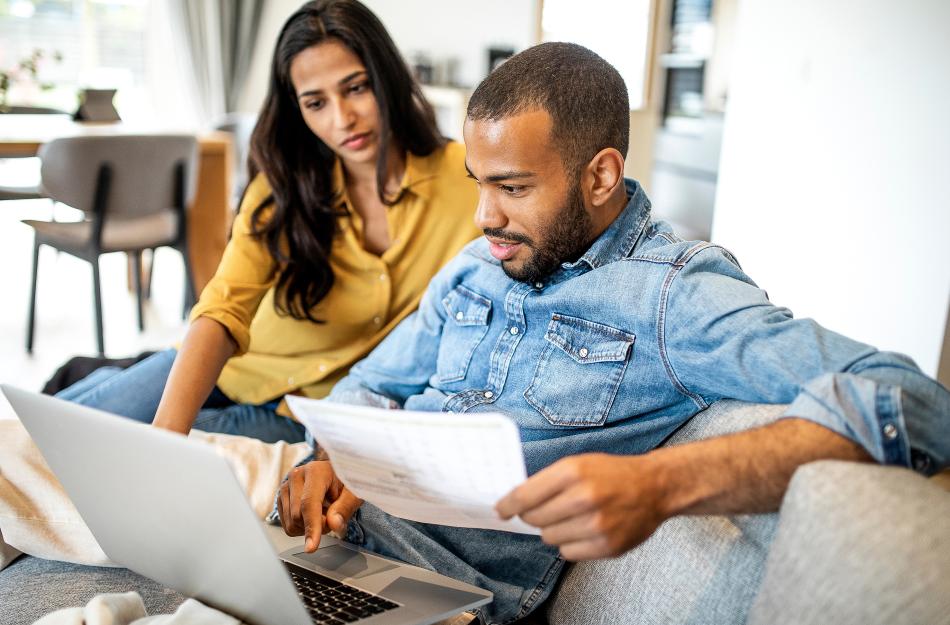 two people looking at their computer