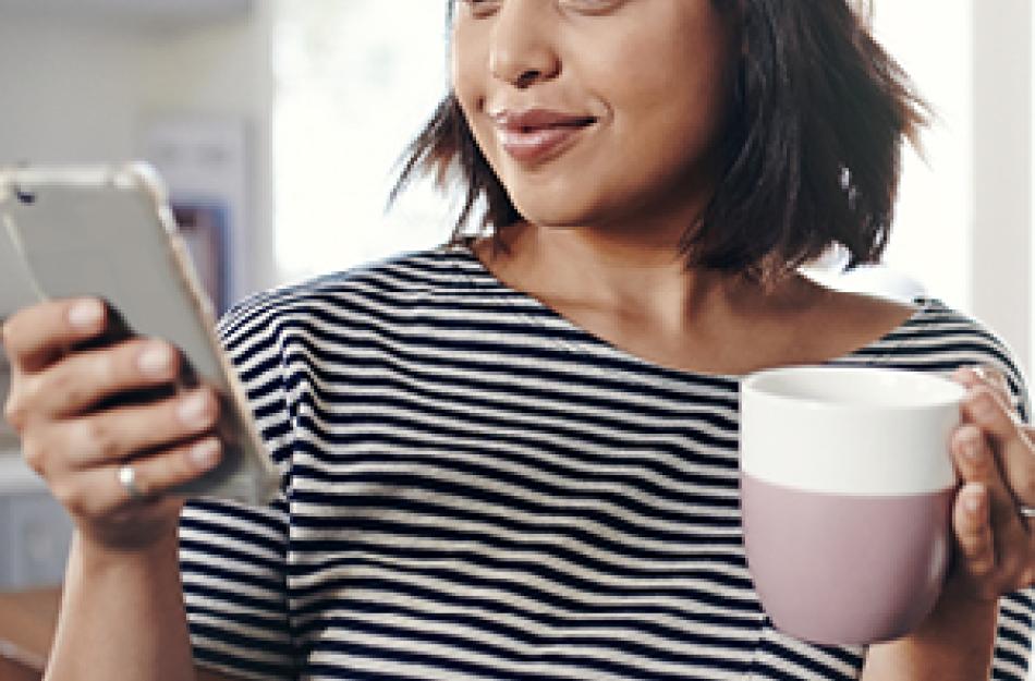 woman looking at her phone
