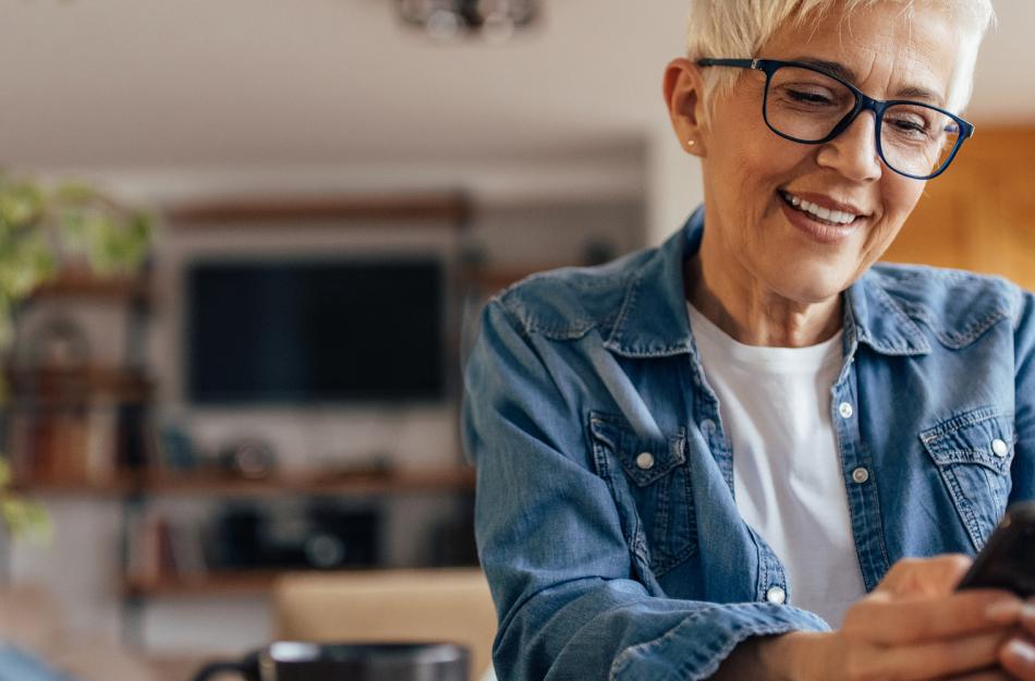 woman looking at her phone