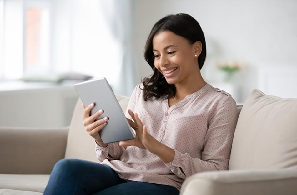picture of a woman looking at the tablet
