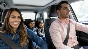 Family driving in a car. 