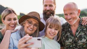 family smiling for a picture